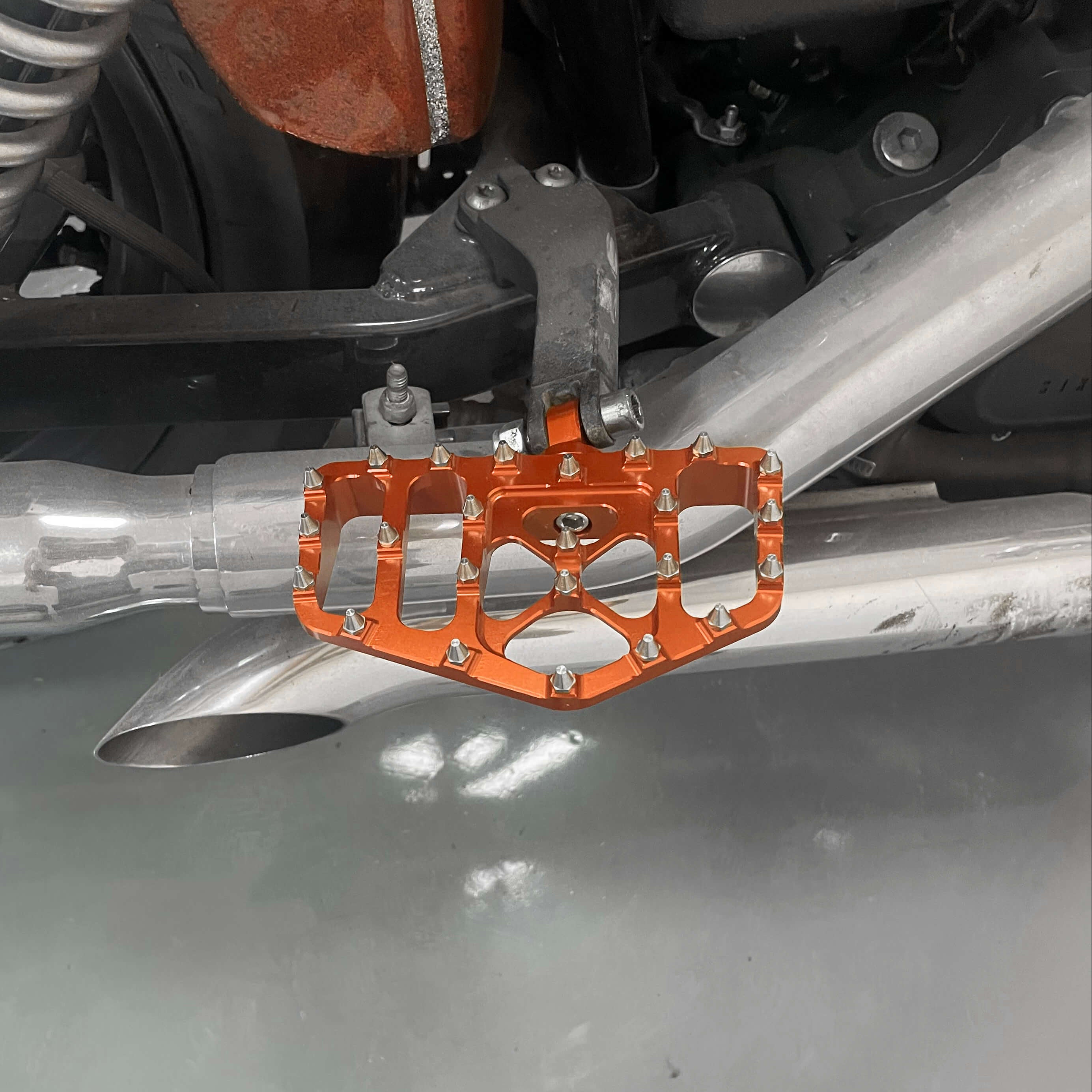 PE011806 Mactions Orange CNC Male Mount-Style Wide Footboards for Harley '84-'25